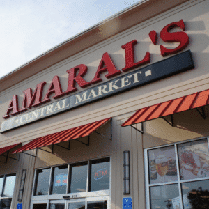 Amaral's Central Market storefront with red awnings.
