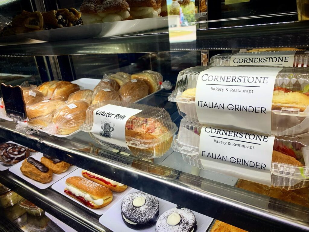 Assorted pastries at Cornerstone Bakery display case.