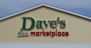 Dave's Fresh Marketplace store sign with logo.